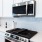 Gourmet-inspired kitchen with stainless steel appliances and quartz countertops