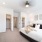 Primary bedroom with walk-in closet and en-suite bathroom in a Balcara at Meridiana home